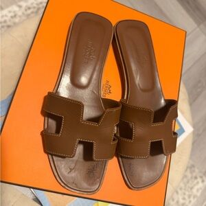 Hermes Gold Oran Leather Sandals with Iconic H-Cut Design